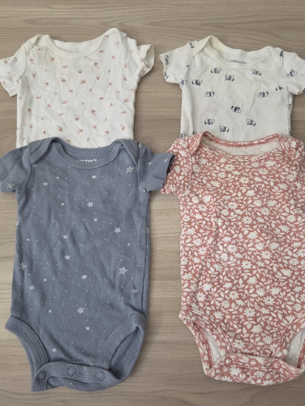 4-Pack Carter's Short Sleeve One-Piece Bodysuits in Blue, Pink, White & Cream